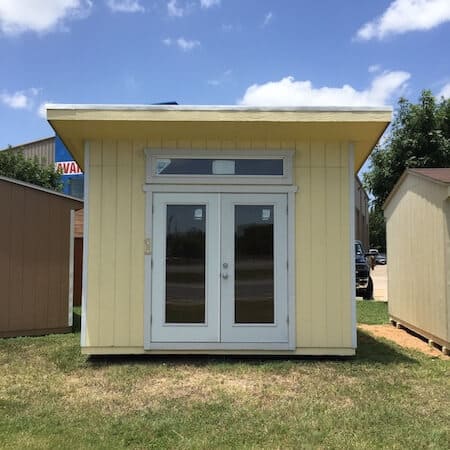 https://affordableportable.com/wp-content/uploads/2019/09/storage-shed-portable-building-product-page-model-modern-yellow-front.jpg
